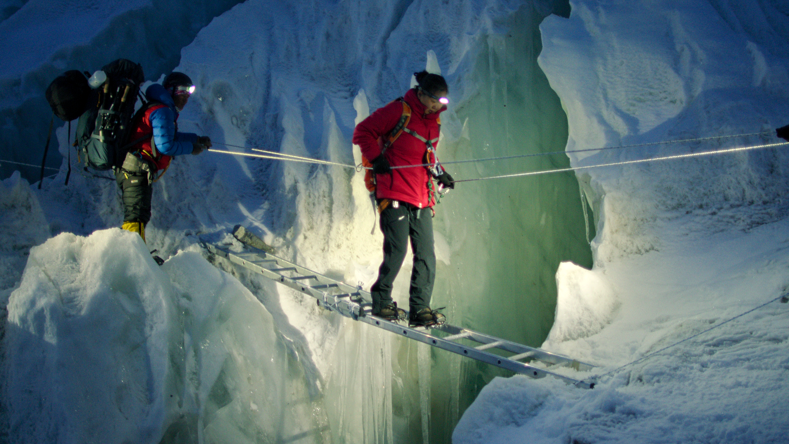 Sherpa helping climber