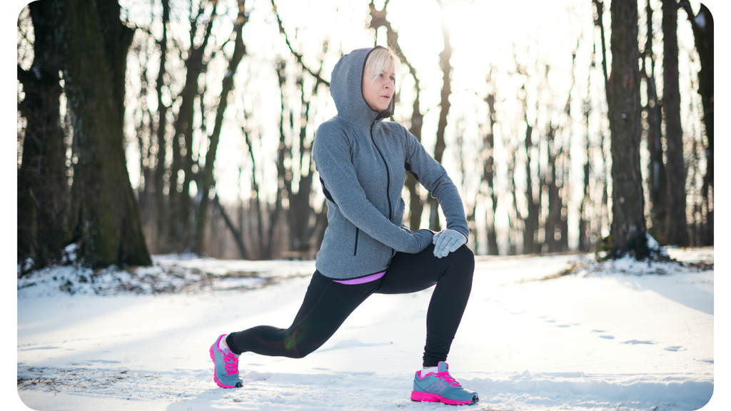 Postpartum Mom Doing Split Squat to Warm Up to Run in MN Winter